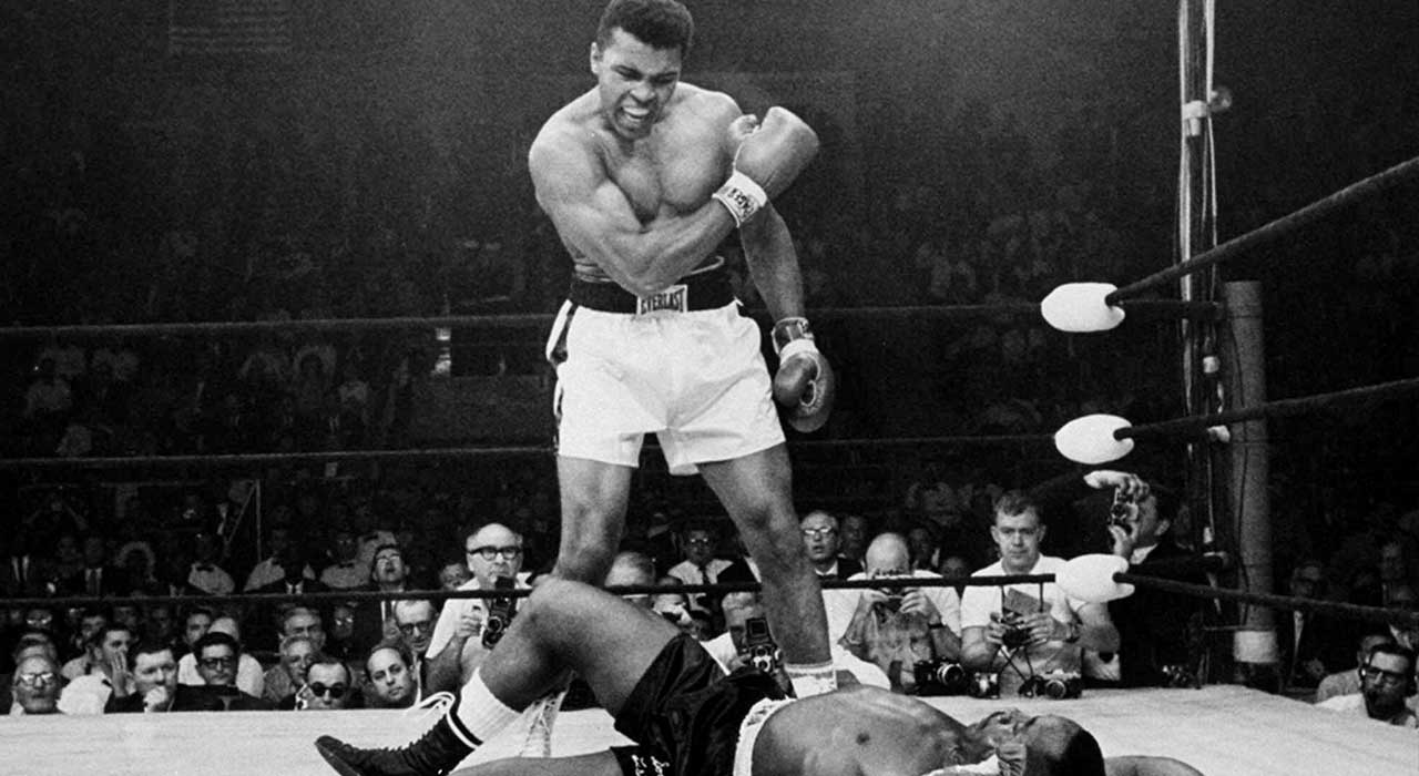 famous picture of muhammad ali standing over sonny liston