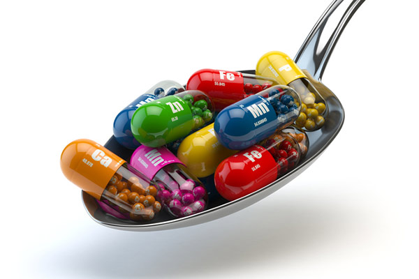 graphic of a spoon with medicine pills on