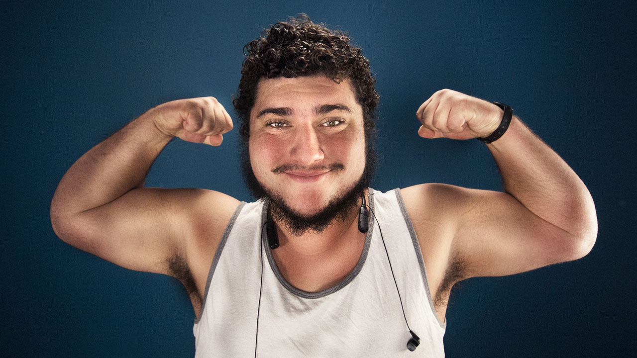 man flexing muscles