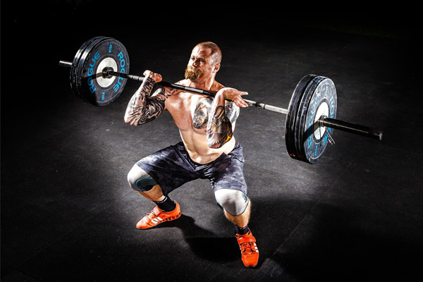 man performing front squat