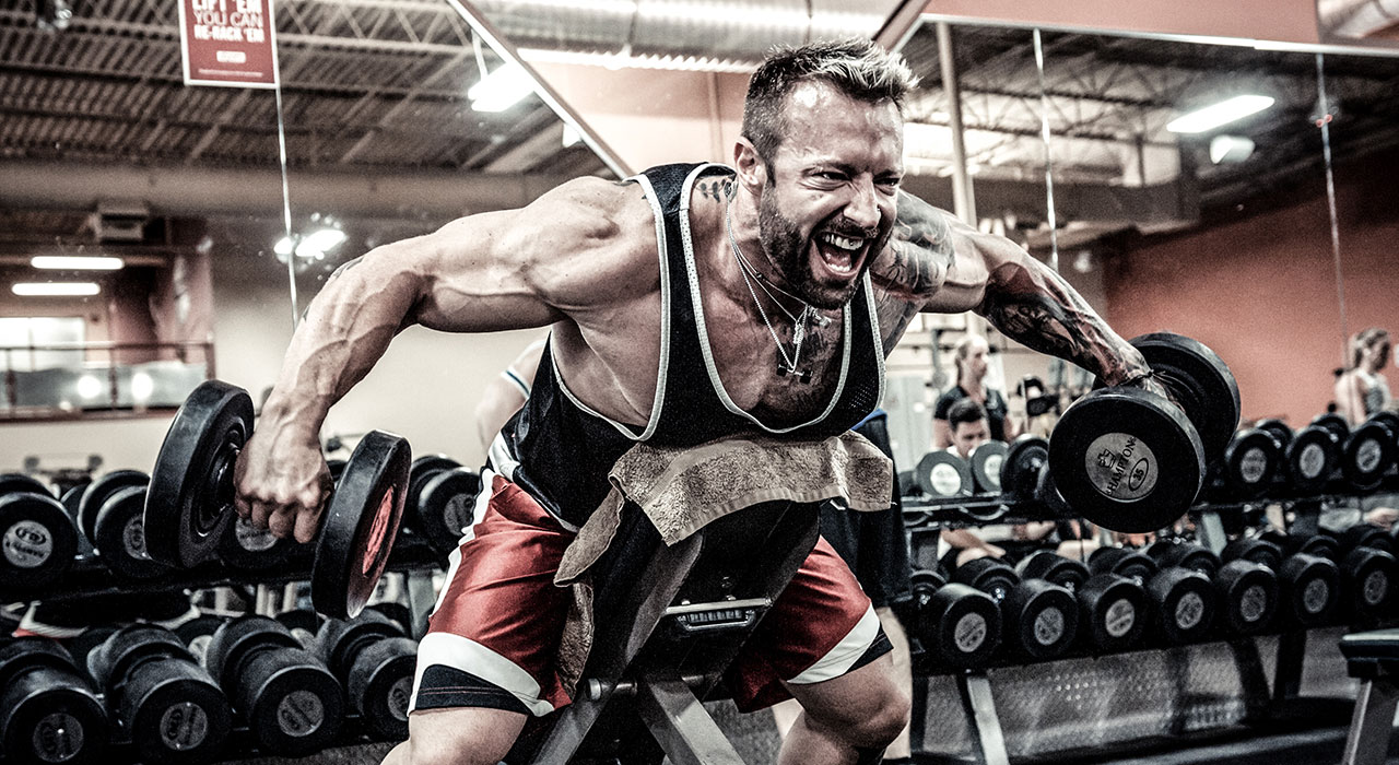 Kris Gethin performing an exercise in the gym