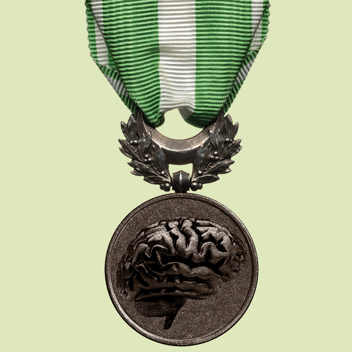 military medal with brain on