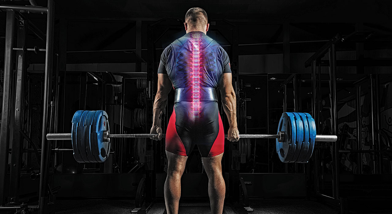 man performing deadlift with his spine luminated red