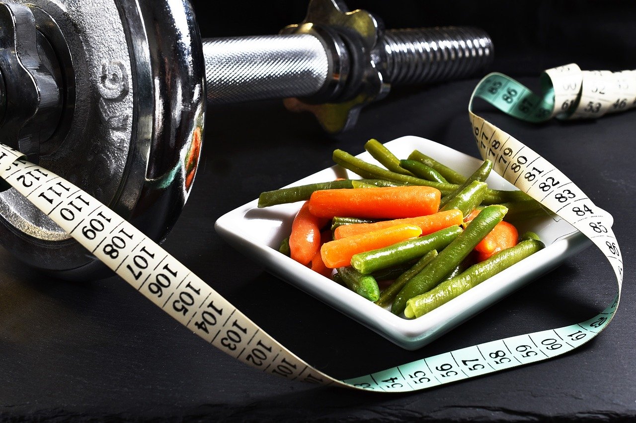 dumbbell vegetables and tape measure