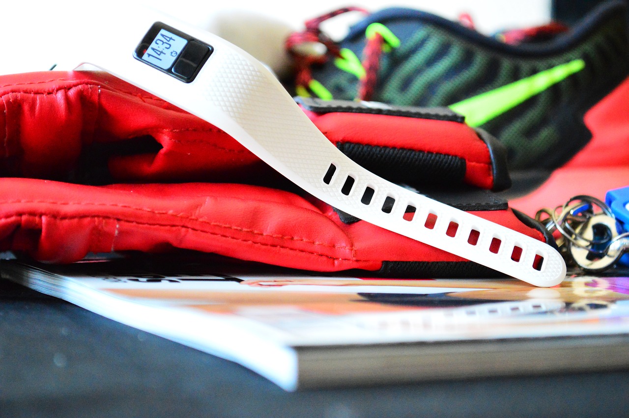 boxing gloves and fitness tech watch