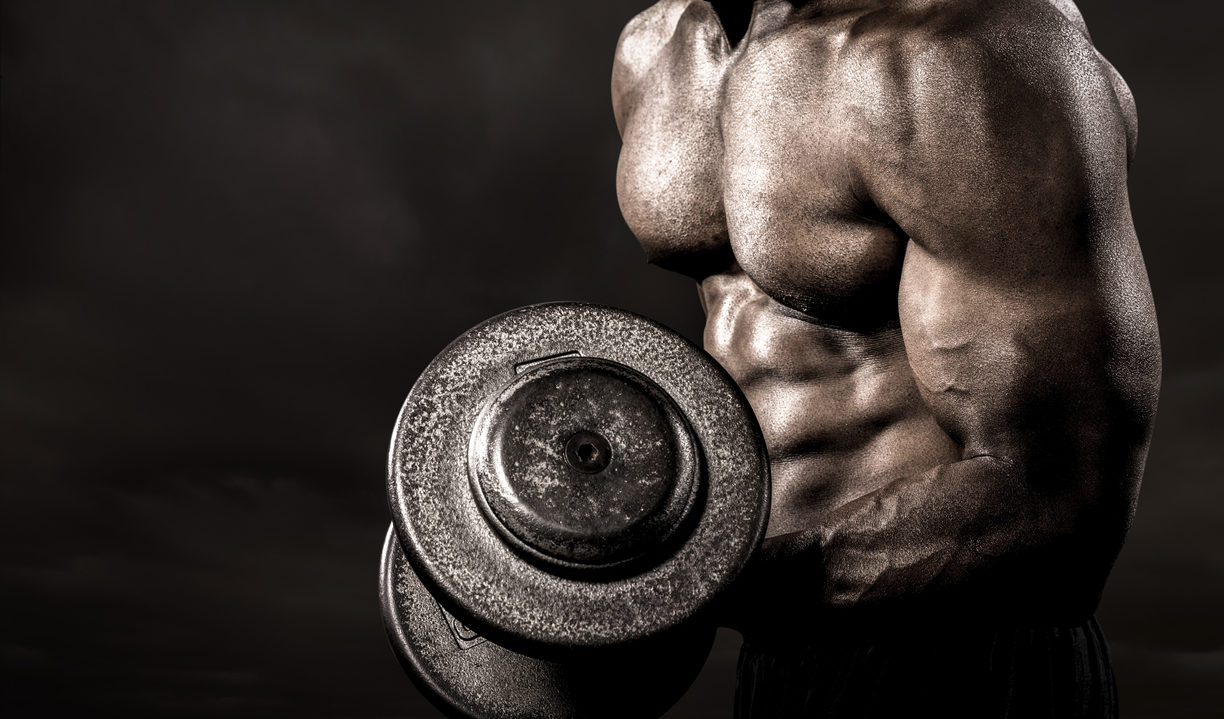 Bodybuilder performing power lift curl